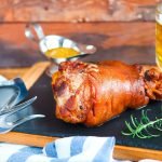Rulka served with garlic sauce and a mug of beer